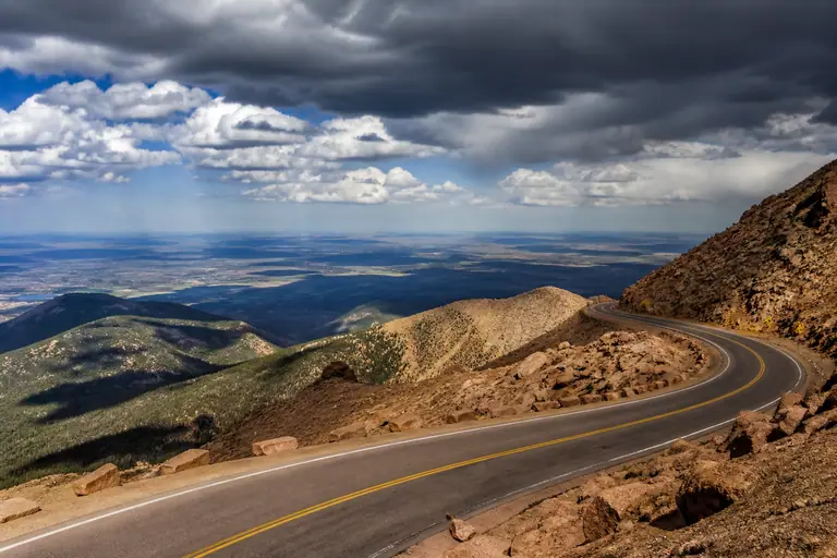 Photoreal editorial image for How to Plan Colorado Springs Around Pikes Peak and Garden of the Gods, inspired by Colorado Springs