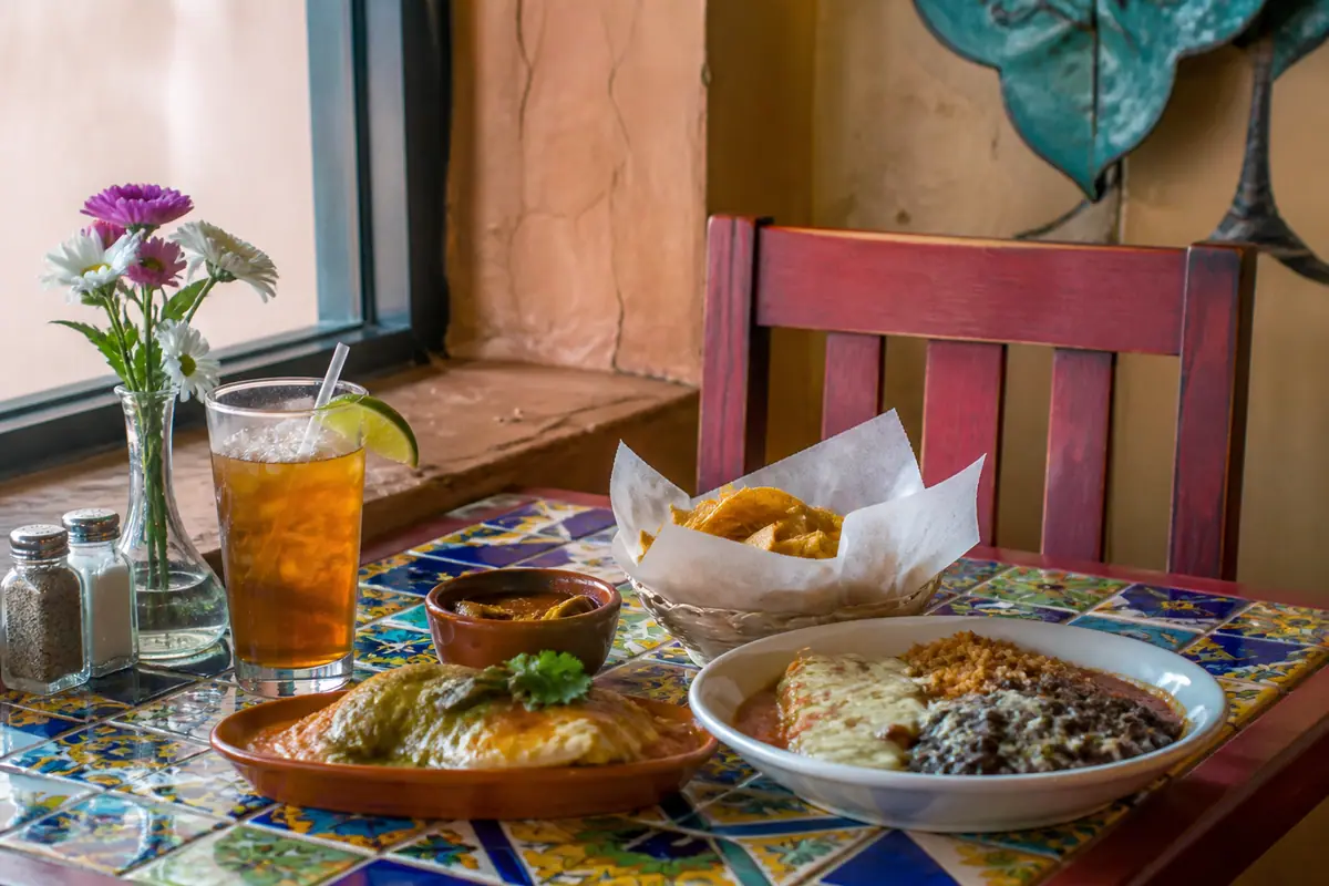 Photoreal travel-editorial view of Cecilia's Cafe in Albuquerque, New Mexico