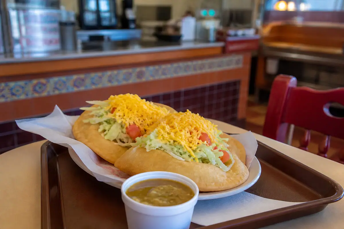 Photoreal travel-editorial view of El Modelo Mexican Foods in Albuquerque, New Mexico