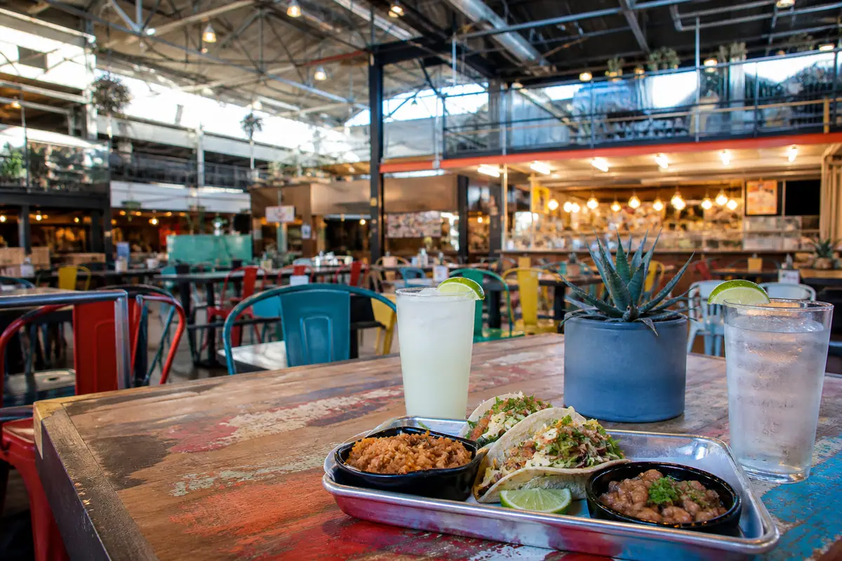 Photoreal travel-editorial view of Sawmill Market in Albuquerque, New Mexico