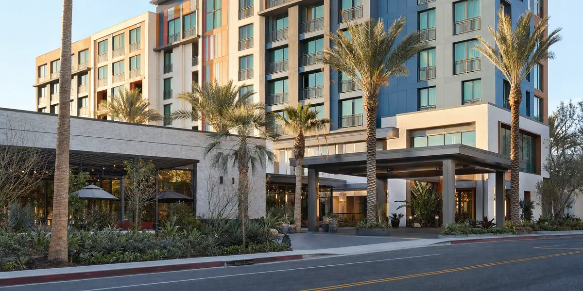 Photoreal hotel exterior representing Hotel Indigo Anaheim in Anaheim