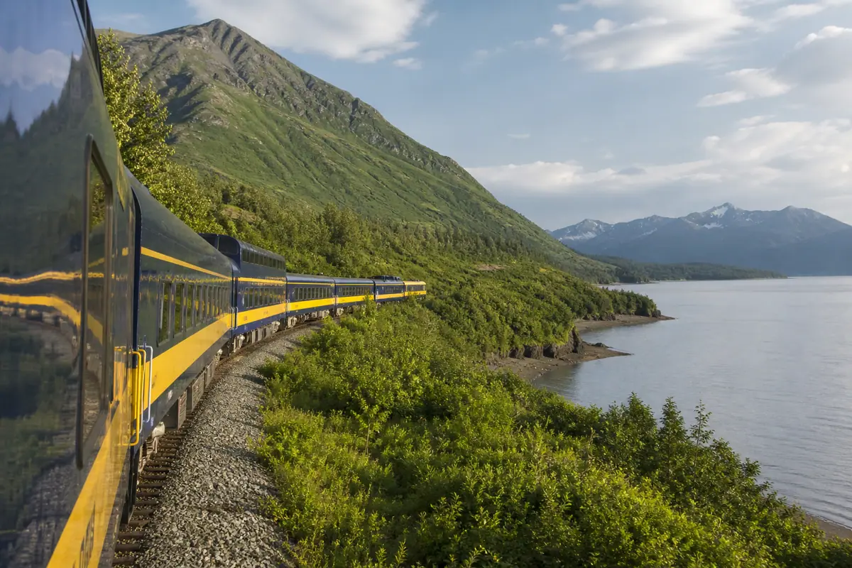 Photoreal travel-editorial view of Alaska Railroad Coastal Classic in Anchorage, Alaska