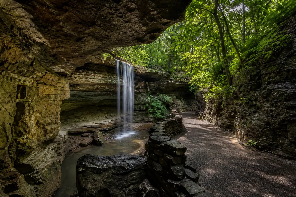Photoreal travel-editorial view of Top of the Rock Lost Canyon Cave and Nature Trail in Branson, Missouri