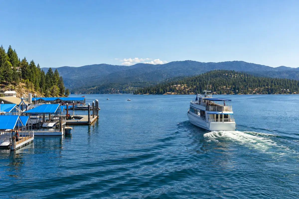 Photoreal editorial view of Coeur d’Alene Resort Boardwalk and Lake Cruise in Coeur d’Alene