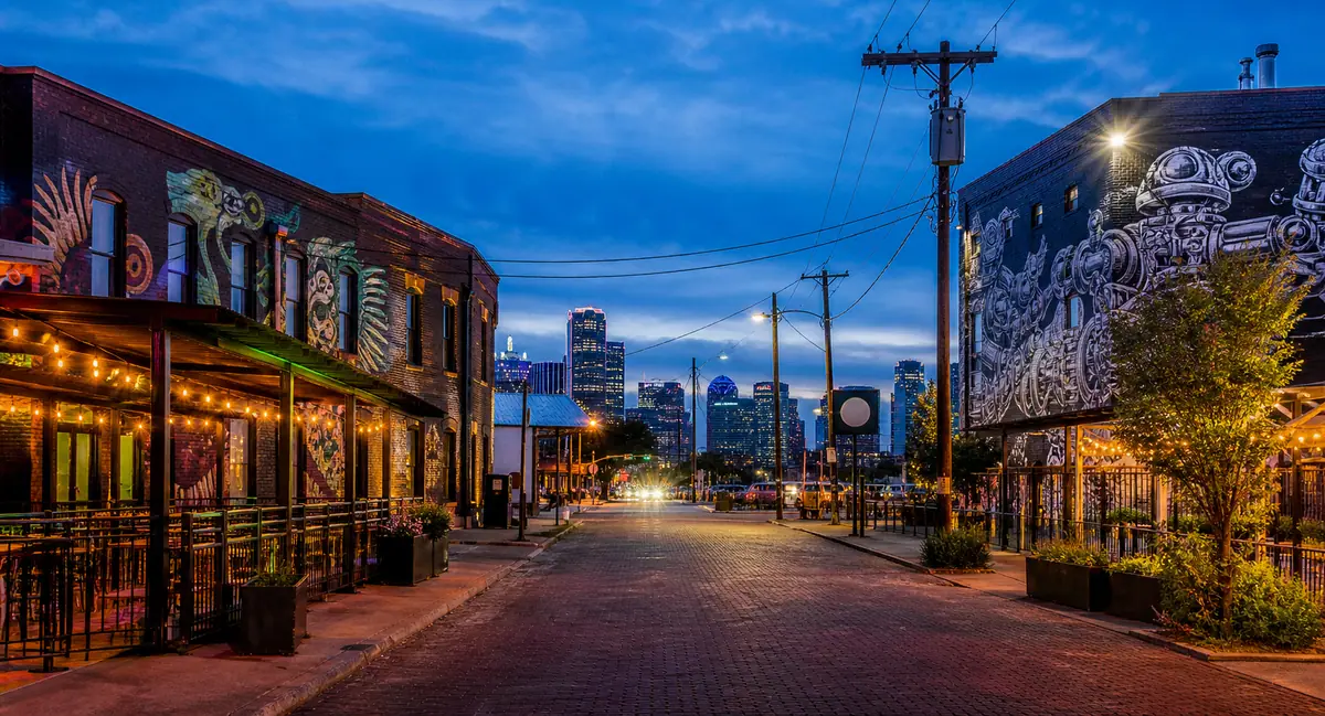 Photoreal eclectic upscale boutique hotel facade in Dallas Uptown at twilight