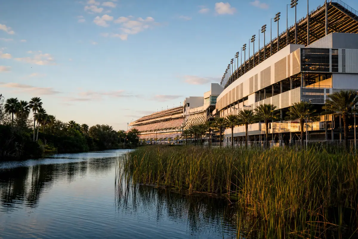 Photoreal travel-editorial view of Daytona International Speedway in Daytona Beach, Florida
