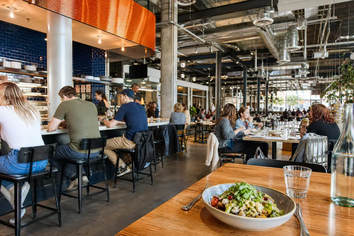 Photoreal dining scene representing Denver Central Market in Denver