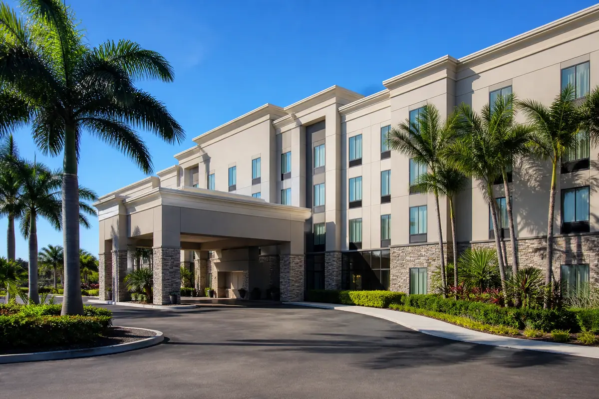 Photoreal travel-editorial view of Hampton Inn & Suites Fort Myers-Colonial Blvd. in Fort Myers, Florida