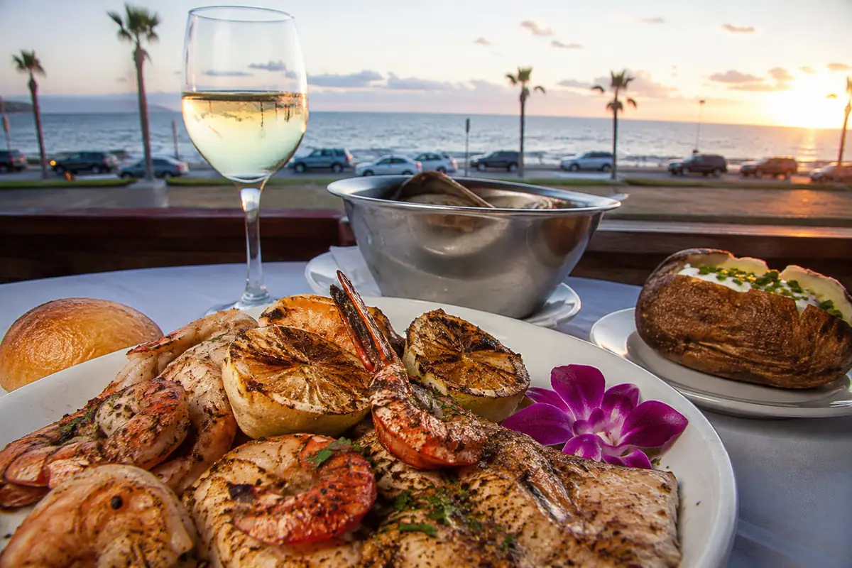 Photoreal travel-editorial view of Willie G's Seafood & Steaks in Galveston, Texas