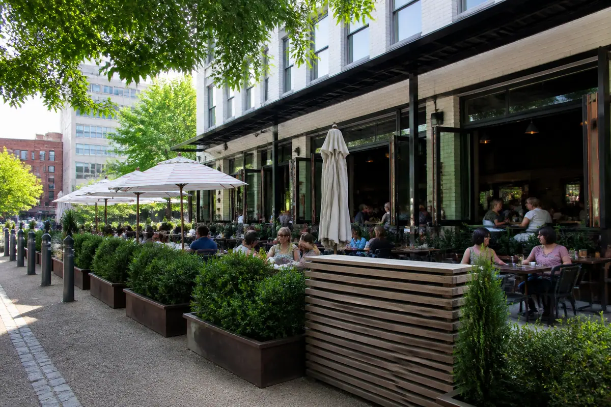 Photoreal dining scene at Biscuit Head in Greenville