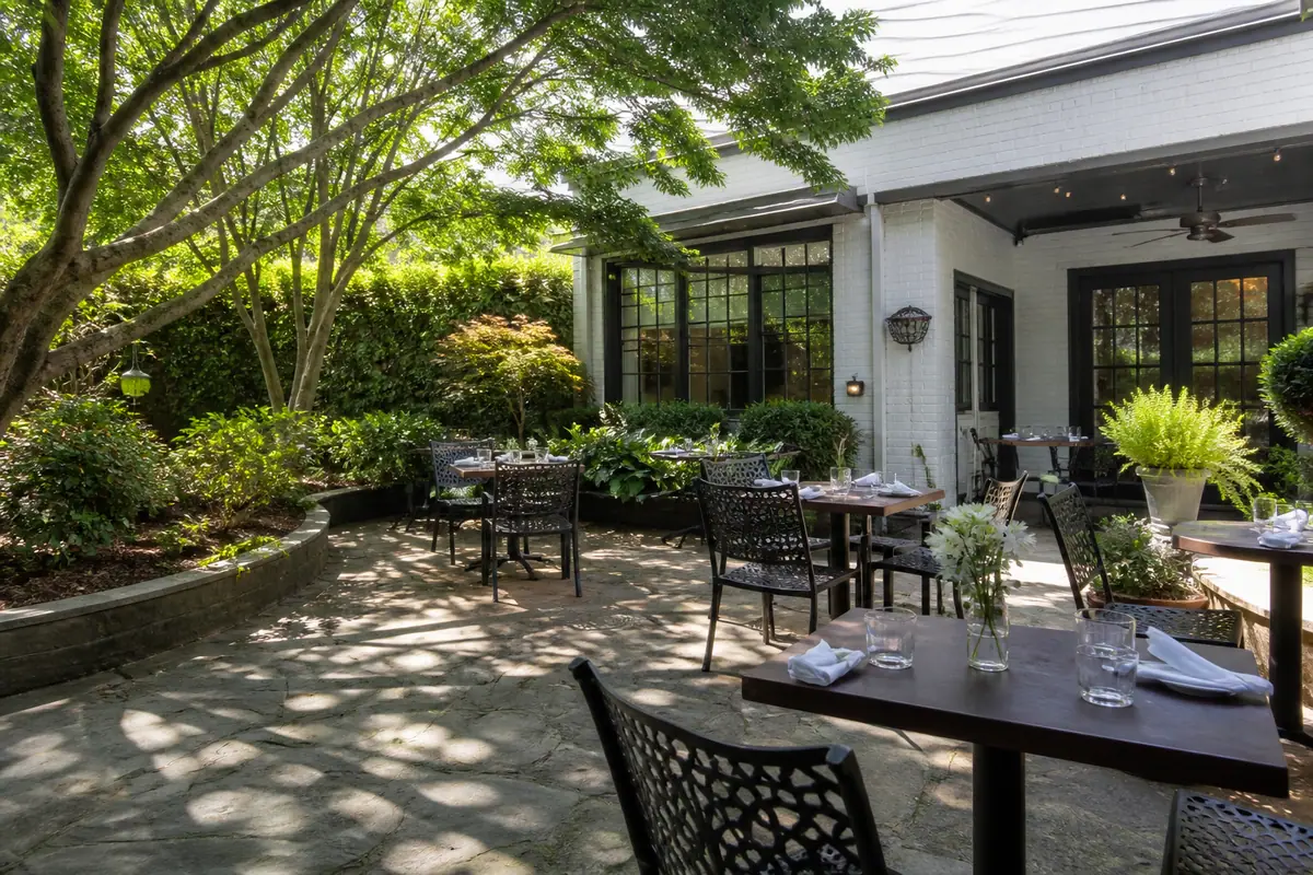 Photoreal dining scene at Halls Chophouse Greenville in Greenville