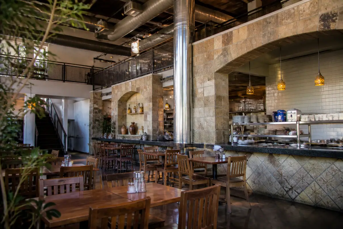 Photoreal dining scene at Pita House in Greenville