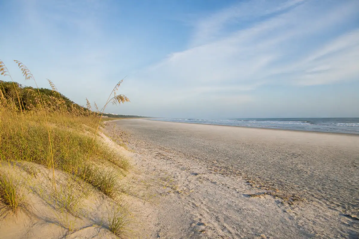 Photoreal travel-editorial view of Coligny Beach Park on Hilton Head Island, South Carolina
