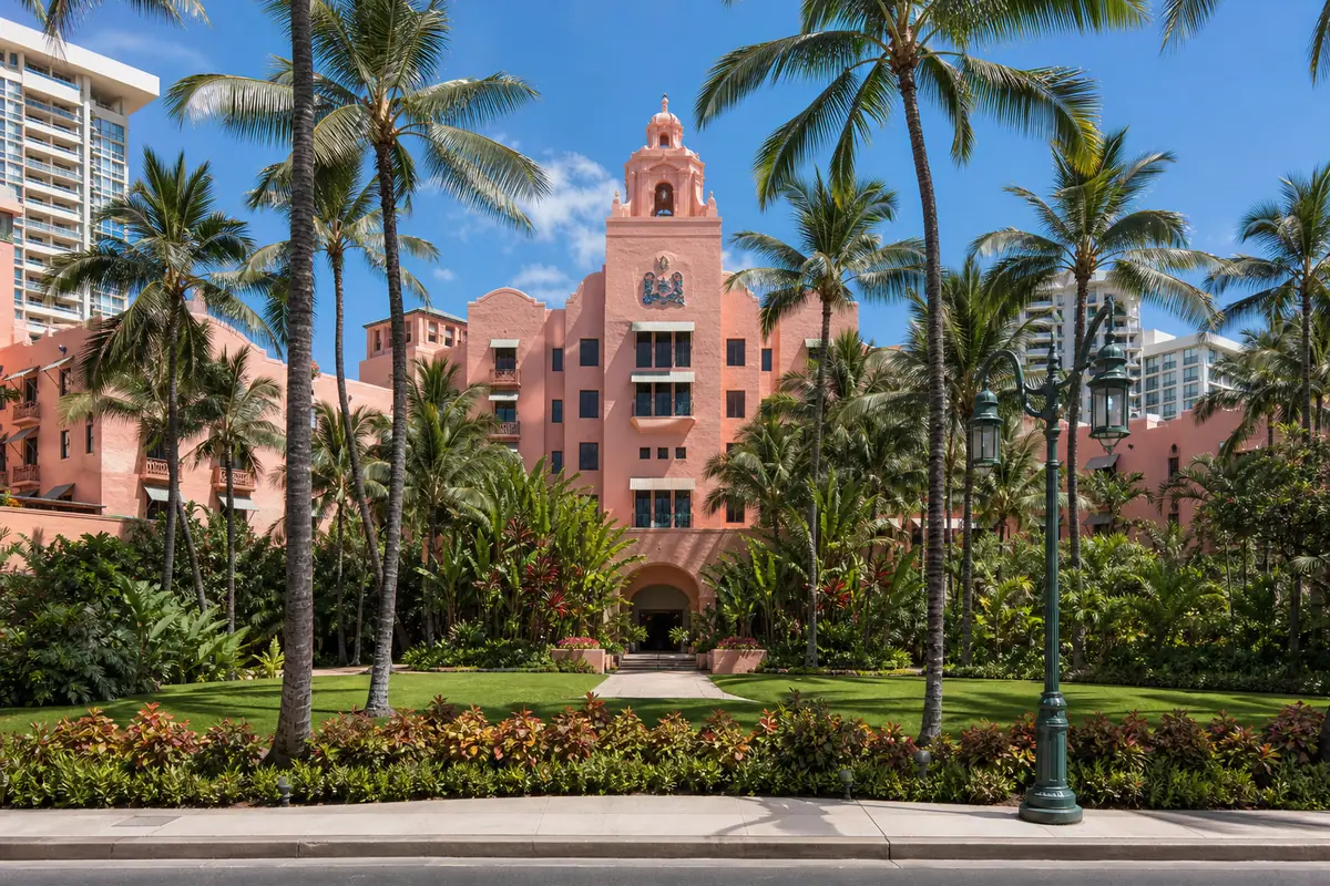 Photoreal pink beachfront facade of The Royal Hawaiian in Waikiki
