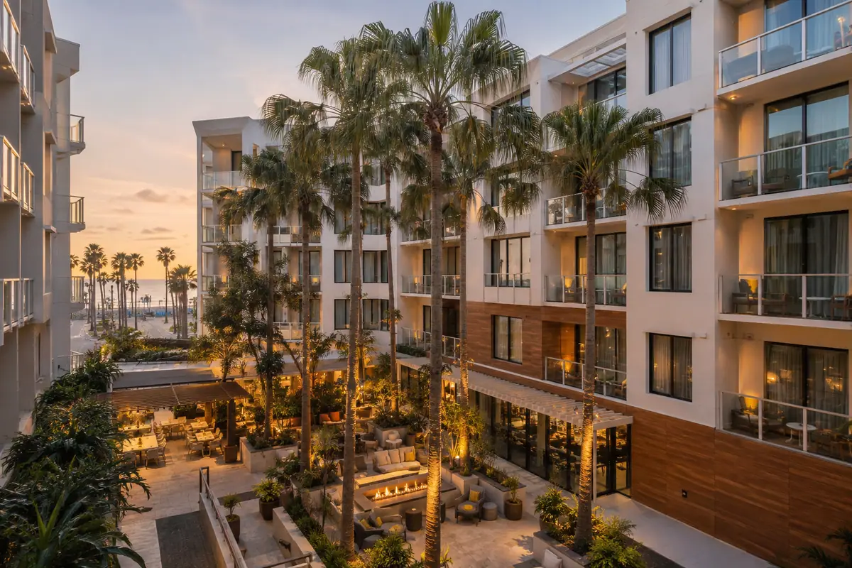Photoreal travel-editorial view of Kimpton Shorebreak Huntington Beach Resort in Huntington Beach, California