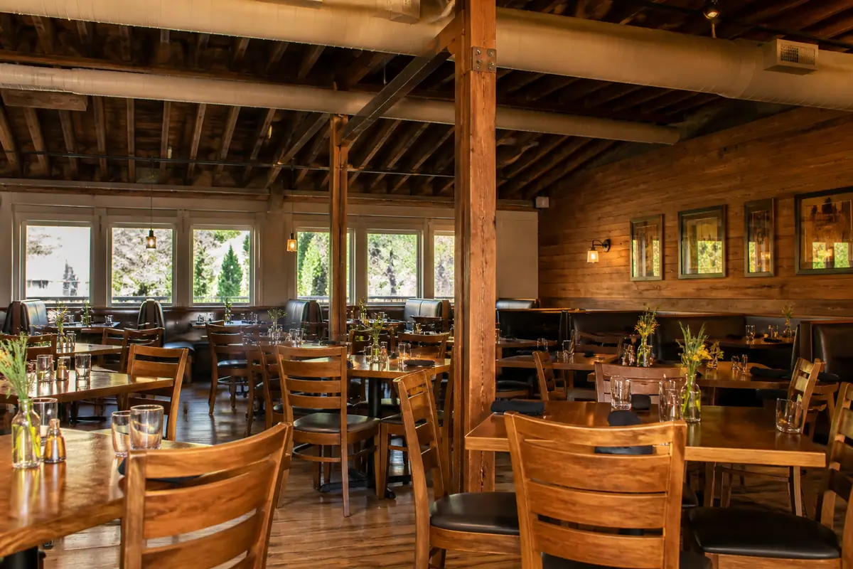 Photorealistic travel-editorial view of The Kitchen in Jackson, Wyoming
