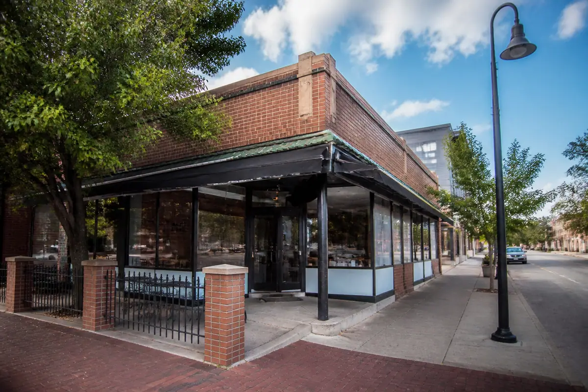Photoreal travel-editorial view of Happy Gillis Cafe & Hangout in Kansas City, Missouri