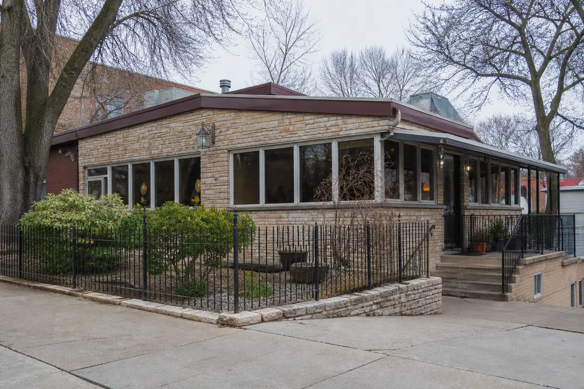 Photoreal travel-editorial view of Kitty's Cafe in Kansas City, Missouri