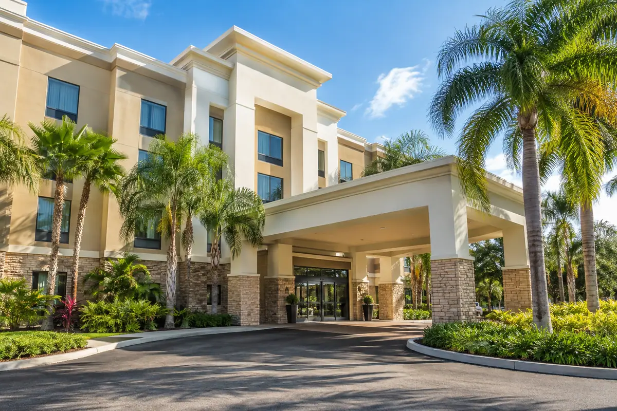 Photoreal travel-editorial view of Hampton Inn & Suites Orlando-South Lake Buena Vista in Kissimmee, Florida