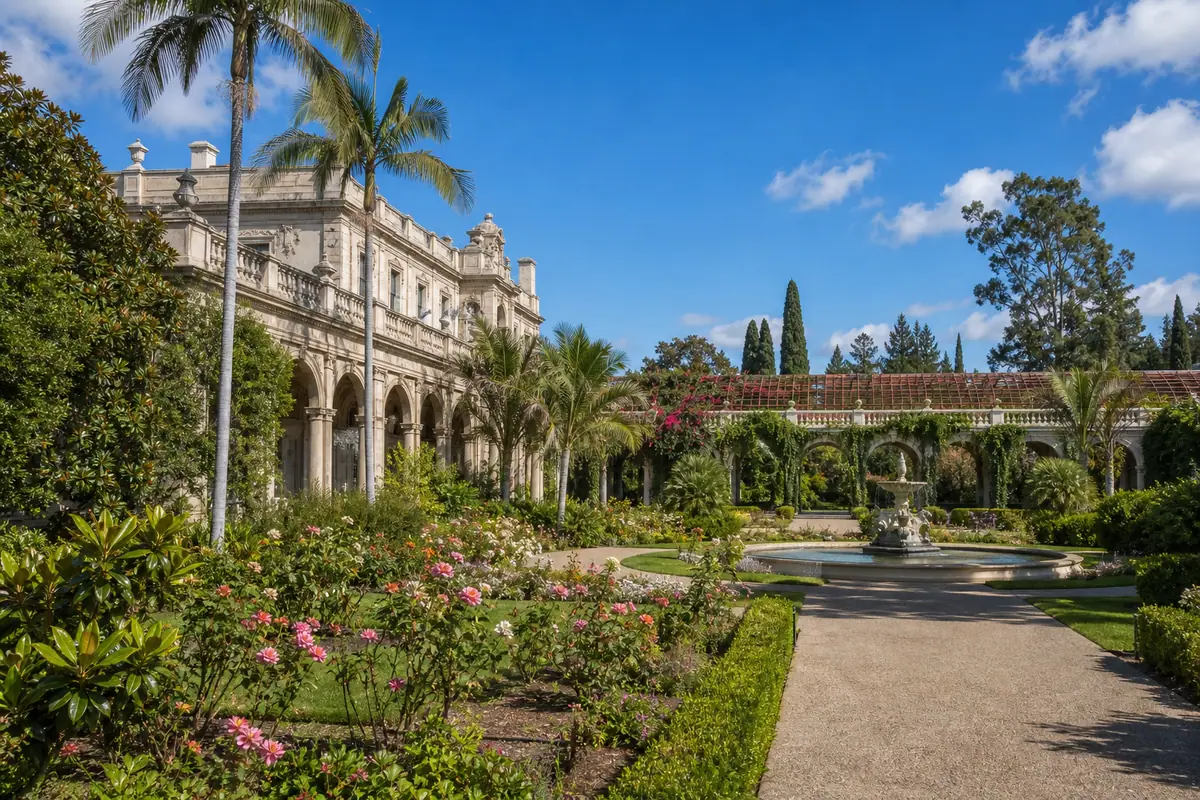 Photoreal estate facade and formal gardens at The Huntington Library and Gardens in bright daylight