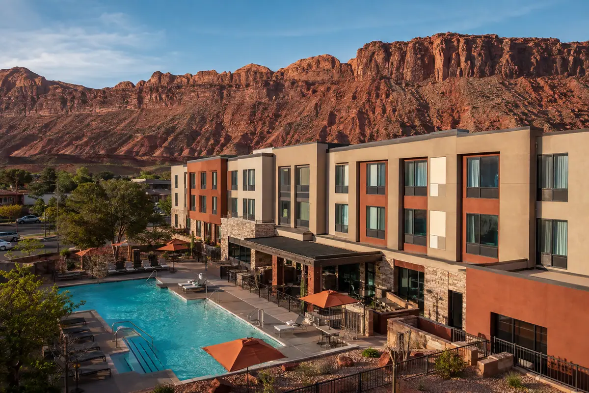 Photoreal travel-editorial view of Hyatt Place Moab in Moab, Utah