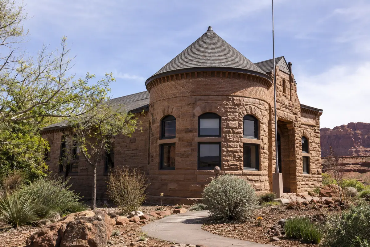 Photoreal travel-editorial view of Moab Museum in Moab, Utah
