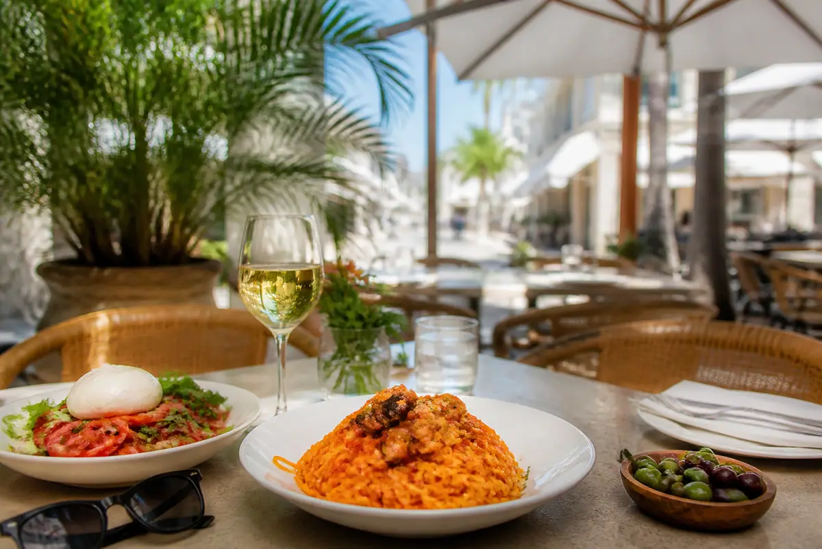 Photoreal travel-editorial view of Bar Tulia in Naples, Florida