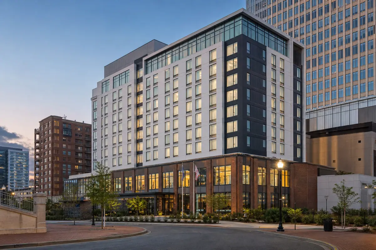 Photoreal downtown hotel exterior representing Courtyard Norfolk Downtown