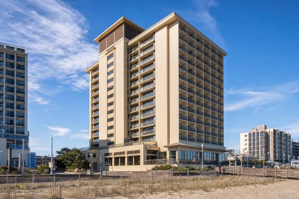 Photoreal exterior of Hilton Ocean City Oceanfront Suites with direct beach access