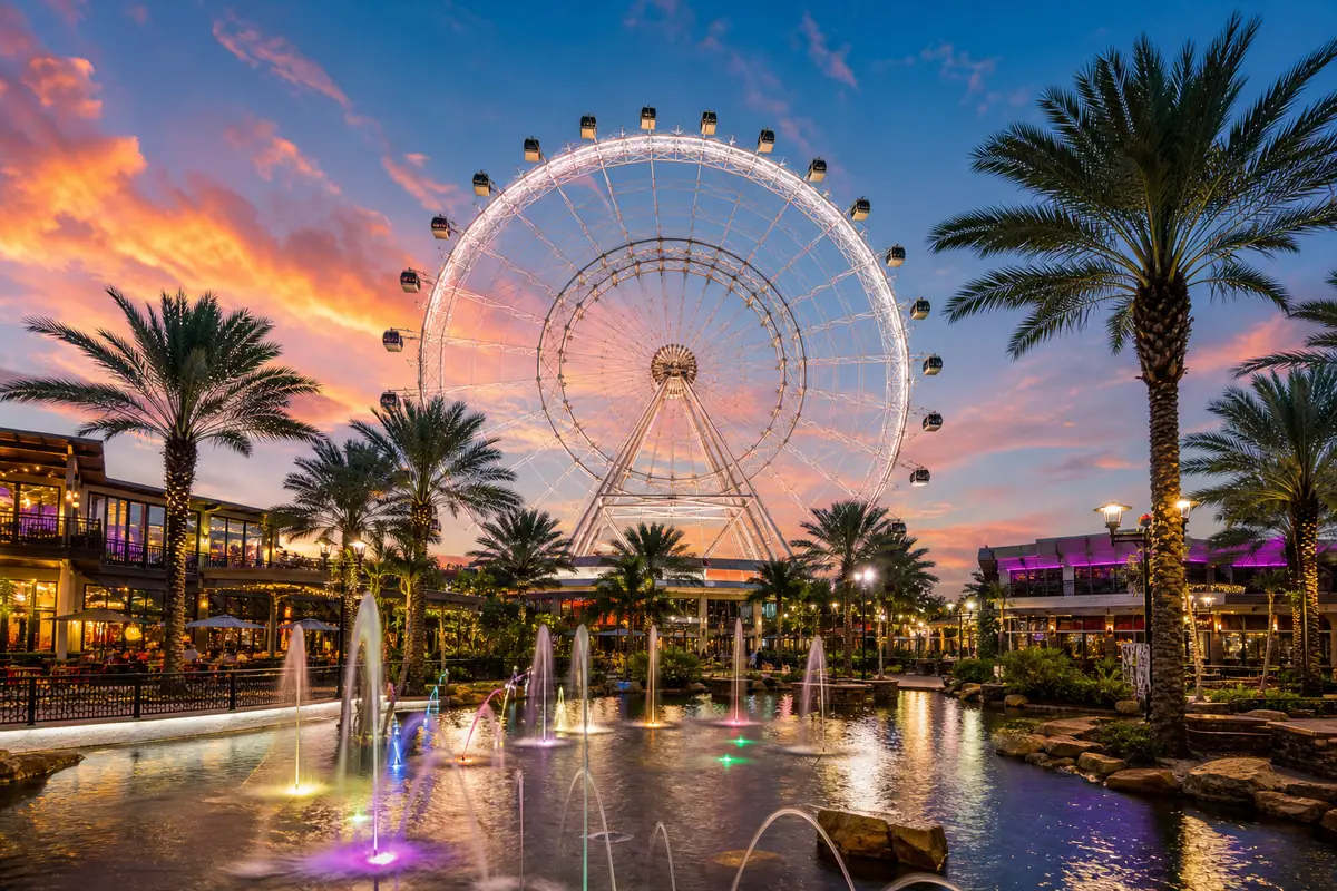 Photoreal entertainment district scene with observation wheel representing ICON Park