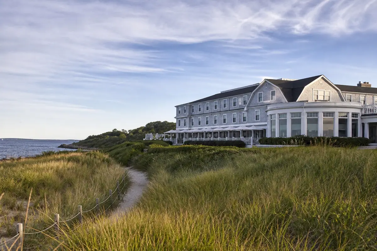 Photoreal exterior or public-space view of Inn by the Sea in Portland, Maine