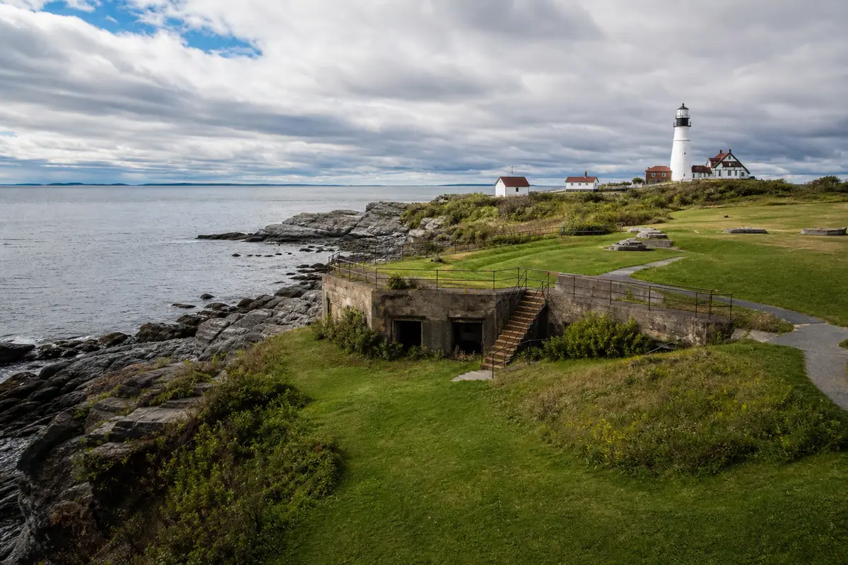 Photoreal travel-editorial view of Fort Williams Park in Portland, Maine