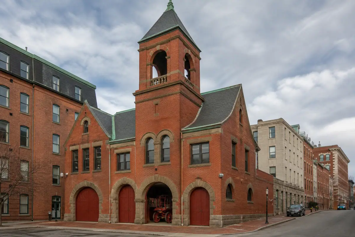 Photoreal travel-editorial view of Portland Fire Museum in Portland, Maine