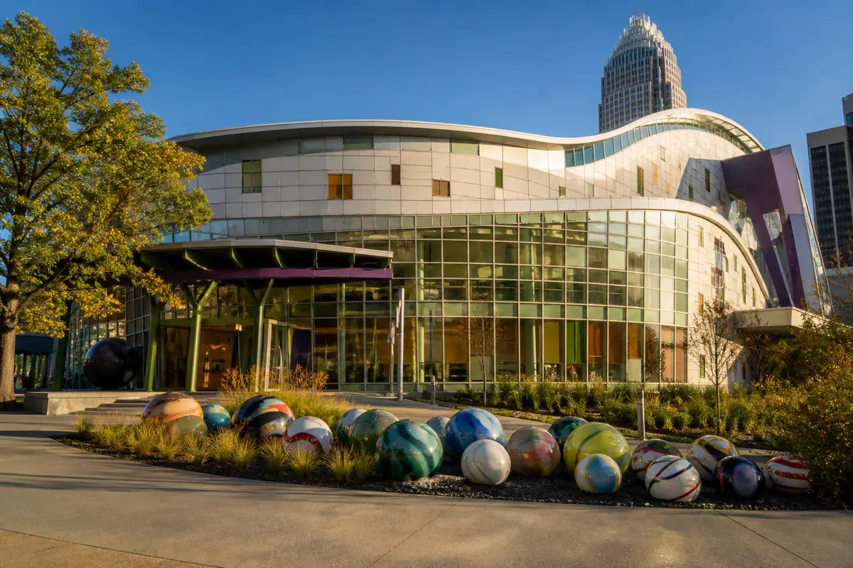 Photorealistic travel-editorial view of Marbles Kids Museum in Raleigh, North Carolina