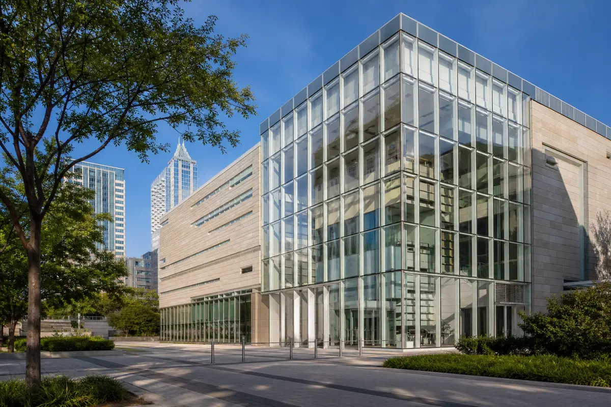 Photorealistic travel-editorial view of North Carolina Museum of Natural Sciences in Raleigh, North Carolina