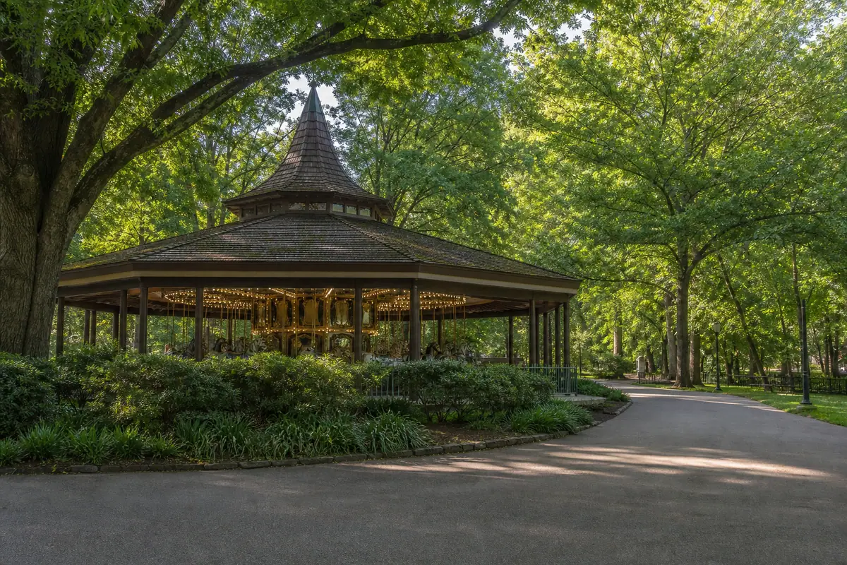 Photorealistic travel-editorial view of Pullen Park in Raleigh, North Carolina