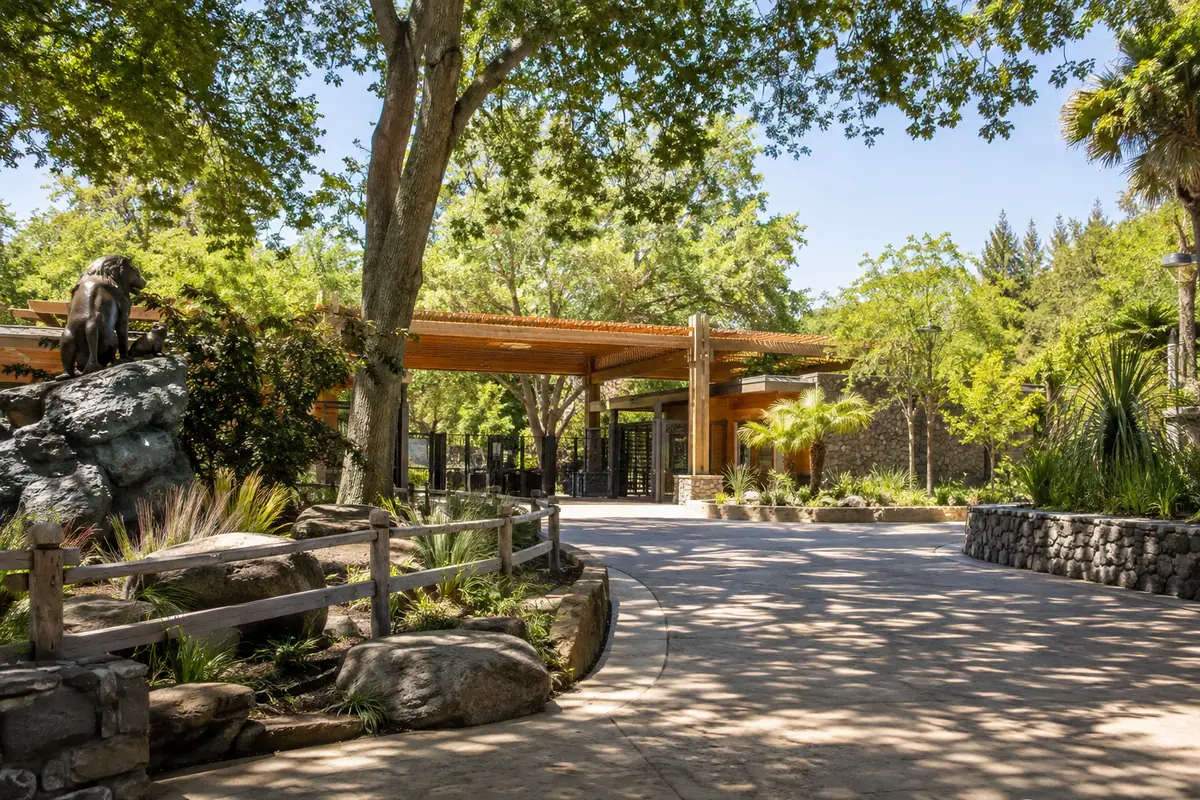 Photorealistic travel-editorial view of Sacramento Zoo in Sacramento, California