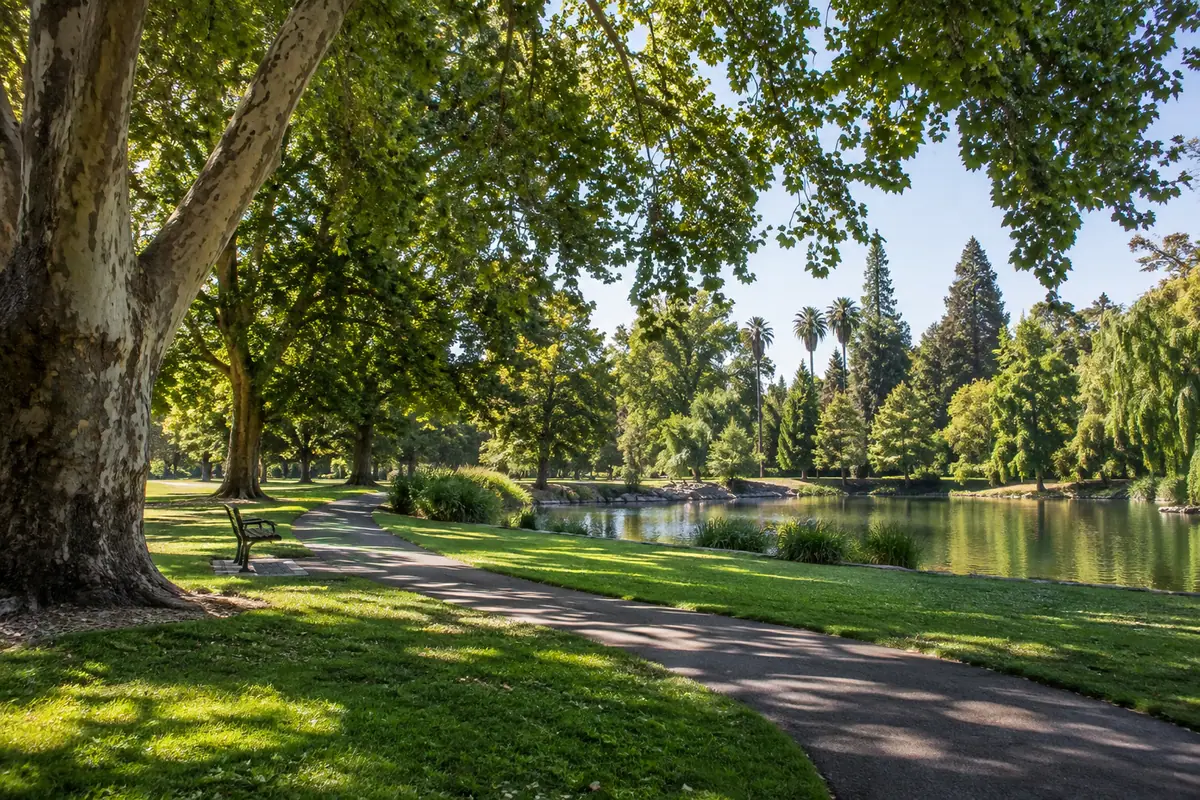 Photorealistic travel-editorial view of William Land Park in Sacramento, California