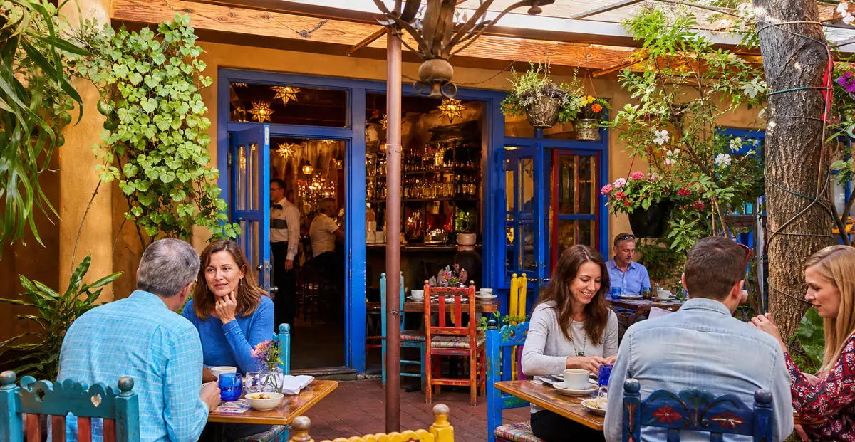 Photoreal dining scene representing Cafe Pasqual’s in Santa Fe