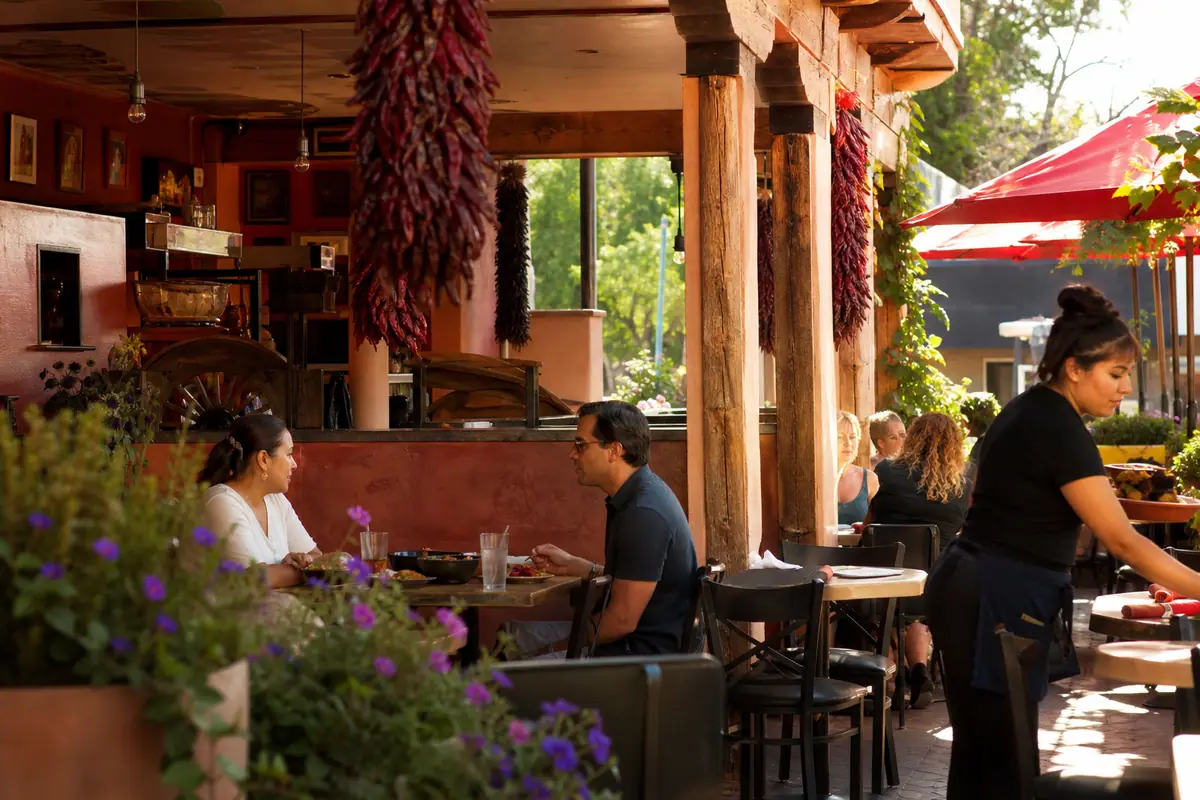 Photoreal dining scene representing El Chile Toreado in Santa Fe