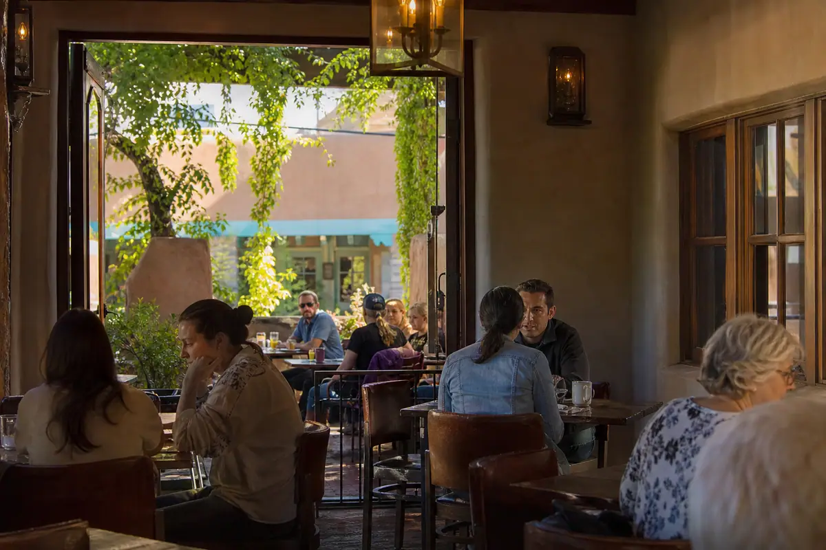 Photoreal dining scene representing Palacio Cafe in Santa Fe