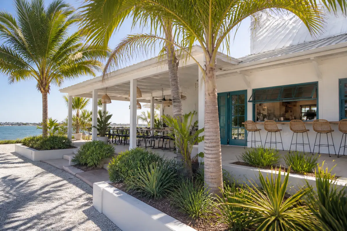 Photoreal travel-editorial view of Breaking Wave Coffee in Sarasota, Florida