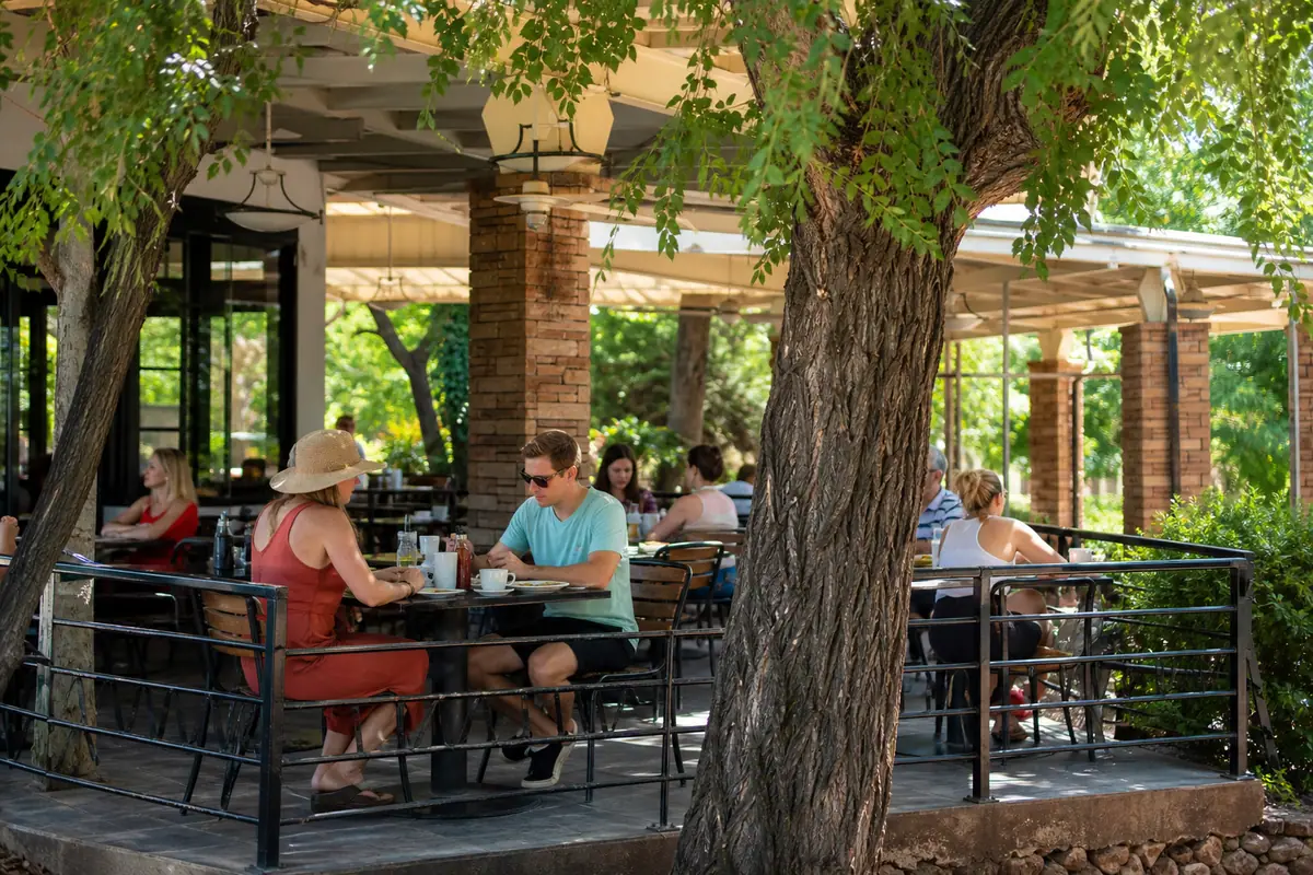 Photoreal travel-editorial view of Pump House Station Urban Eatery in Sedona, Arizona