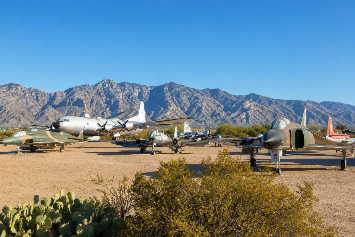 Photoreal travel-editorial view of Pima Air & Space Museum in Tucson, Arizona