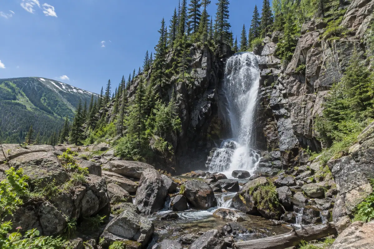 Travel-editorial view of Booth Falls Trail in Vail, Colorado